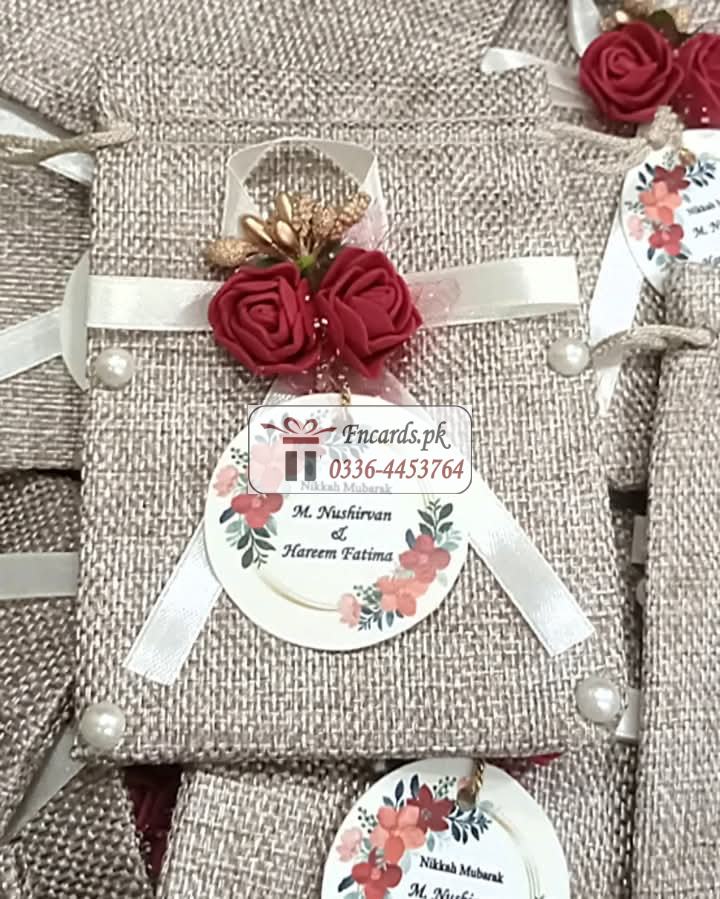 Pouch Bid Boxes With Ribbon And Mahroon Flowers