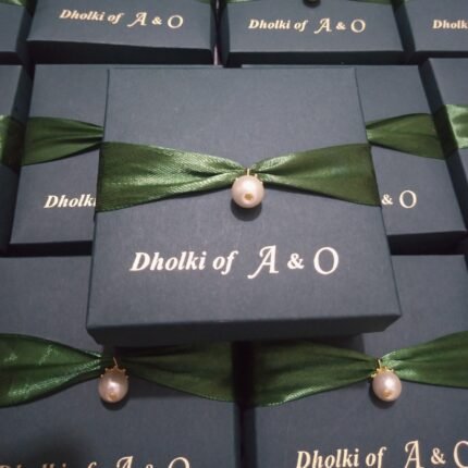 Black Bid Boxes With Green Ribbon